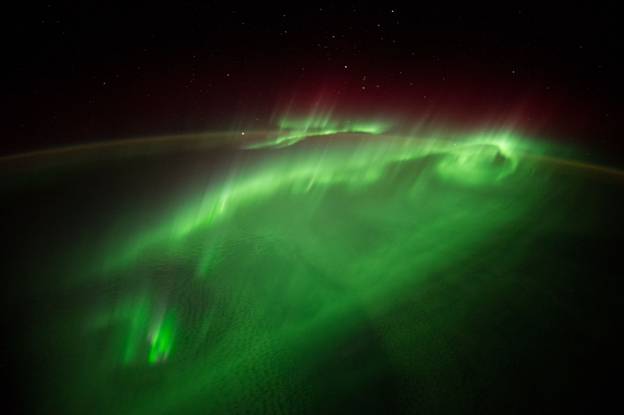 https://images.boredomfiles.com/wp-content/uploads/2019/07/Aurora-From-Space.jpg